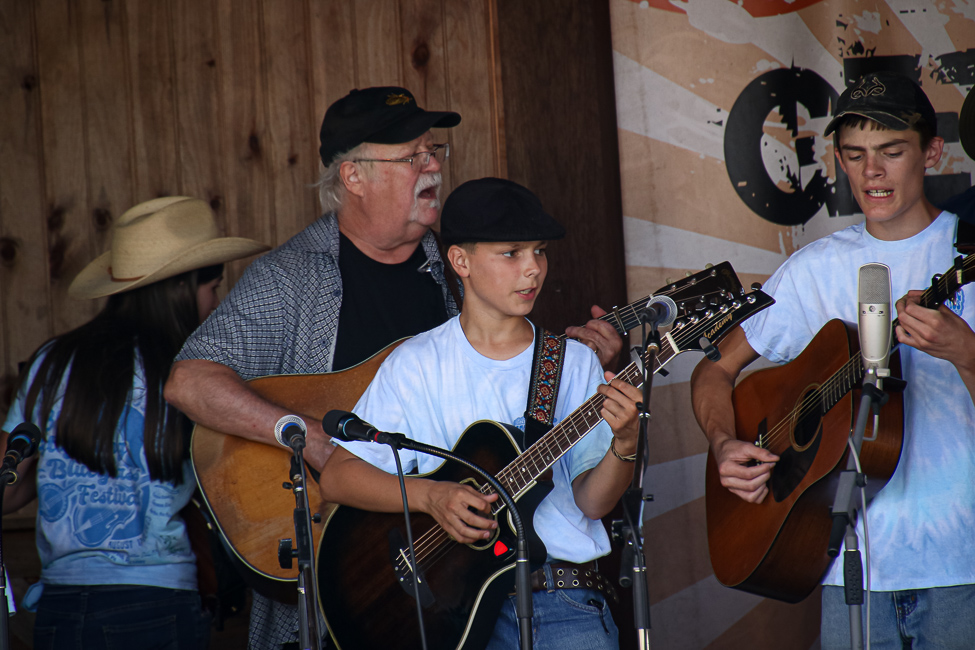 Dudley Connell joins in with Kids Academy performance at the August 2023 Gettysburg Bluegrass Festival - photo © Frank Baker