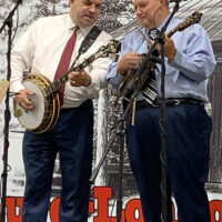 Dean Osborne on banjo and Rob Morgan on mandolin with Higher Vision at the 2023 Pickin' for the Kids Bluegrass festival - photo © Roger Black