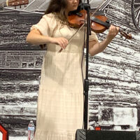 Kasey O'Neal with Kentucky Just Us at the 2023 Pickin' for the Kids Bluegrass festival - photo © Roger Black