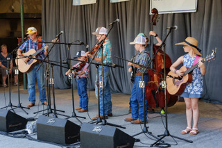 Carolina Cowboys and Maggie (first youth band) at the 2023 Ashe County Bluegrass and Old Time Fiddlers' Convention