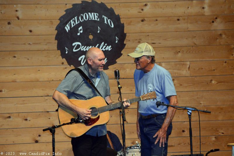 Promoter Joe Soward sings one with Darren Nicholson at the 2023 Dumplin Valley Bluegrass Festival - photo © Bill Warren