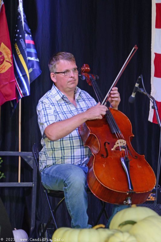 Chris Sexton joins Rhonda Vincent & The Rage on cello at the Nothin' Fancy Bluegrass Festival - photo © Bill Warren