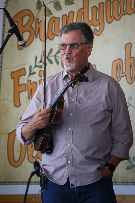 Mike Hartgrove with Lonesome River Band at the 2023 Delaware Valley Bluegrass Festival - photo © Frank Baker