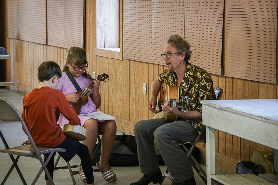 Kids Academy teacher Ira Gitlin works with ukulele students at the 2023 Delaware Valley Bluegrass Festival - photo © Frank Baker