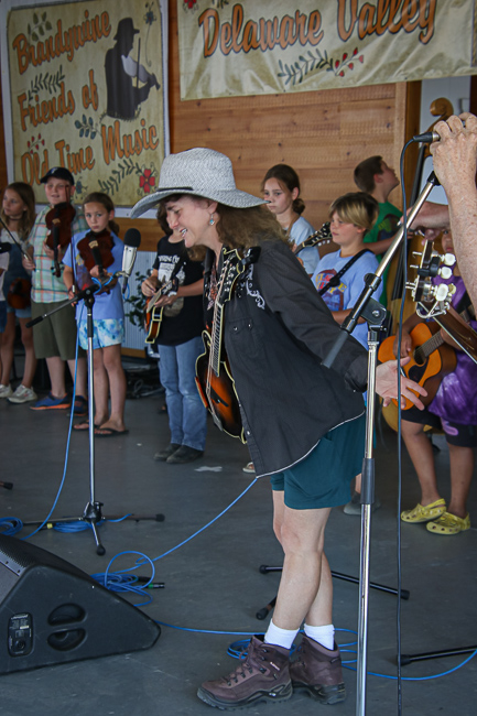 Kids Academy teacher Tara Linhardt takes a bow at the 2023 Delaware Valley Bluegrass Festival - photo © Frank Baker