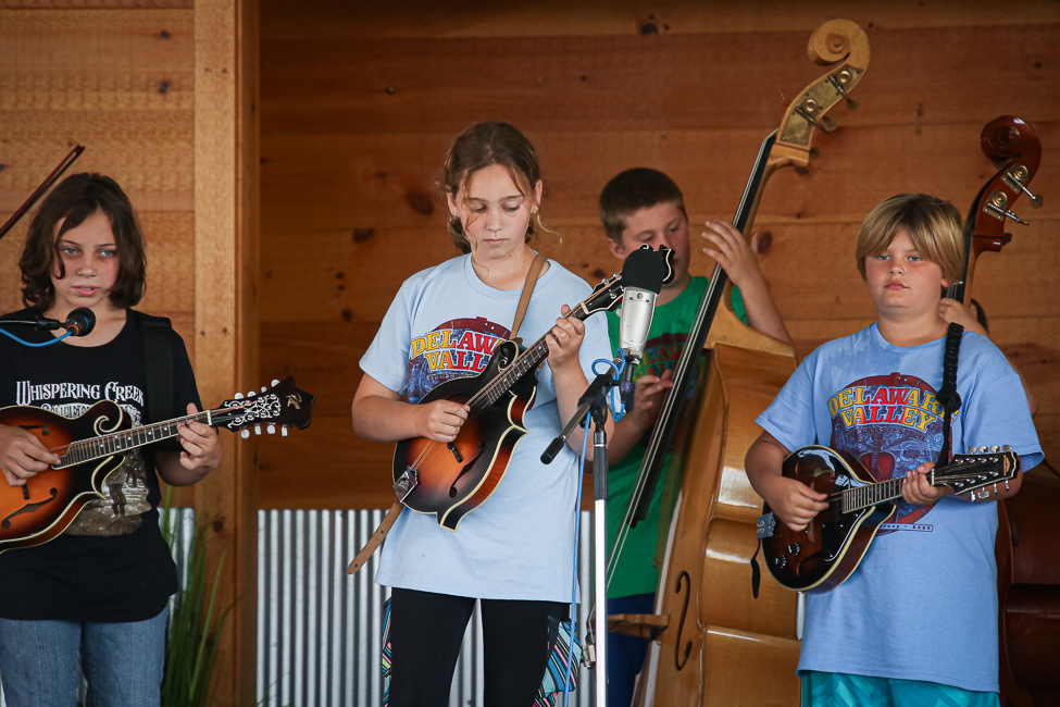 Kids Academy students on stage at the 2023 Delaware Valley Bluegrass Festival - photo © Frank Baker
