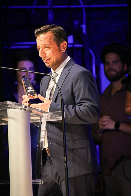 Jason Carter accepts for Fiddle Player of the Year at the 2023 IBMA Bluegrass Music Awards - photo © Frank Baker