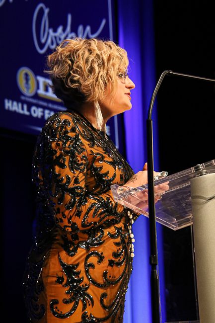 Laura Orshaw inducts Wilma Lee Cooper into the Bluegrass Music Hall of Fame at the 2023 IBMA Bluegrass Music Awards - photo © Frank Baker