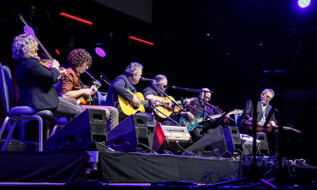 The Kruger Brothers play Doc Watson at the Red Hat Amphitheater during IBMA Bluegrass Live! (9/30/23) - photo © Frank Baker
