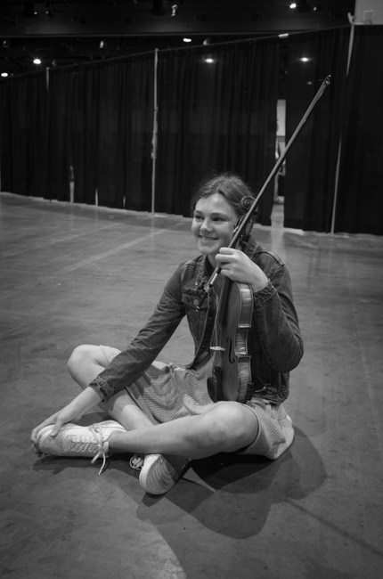 Young fiddler in the Exhibit Hall at IBMA Bluegrass Live! (9/30/23) - photo © Jeromie Stephens
