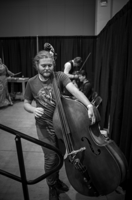 Jackson Earles heads for the next jam at IBMA Bluegrass Live! (9/30/23) - photo © Jeromie Stephens