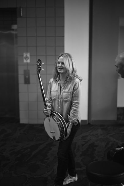 Try out banjos in the Exhibit Hall at IBMA Bluegrass Live! (9/30/23) - photo © Jeromie Stephens
