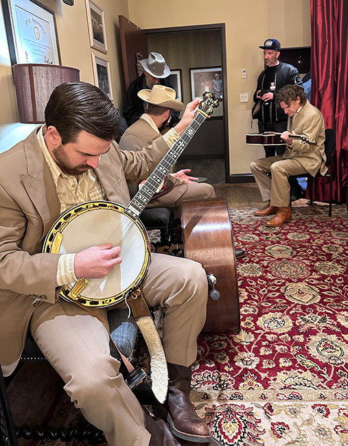 Cory Walker and East Nash Grass warming up before their Grand Ole Opry debut (10/31/23) - photo © Joe Sanderson