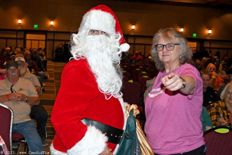 Lorraine and Santa want YOU at the 2023 Bluegrass Christmas in the Smokies - photo © Bill Warren