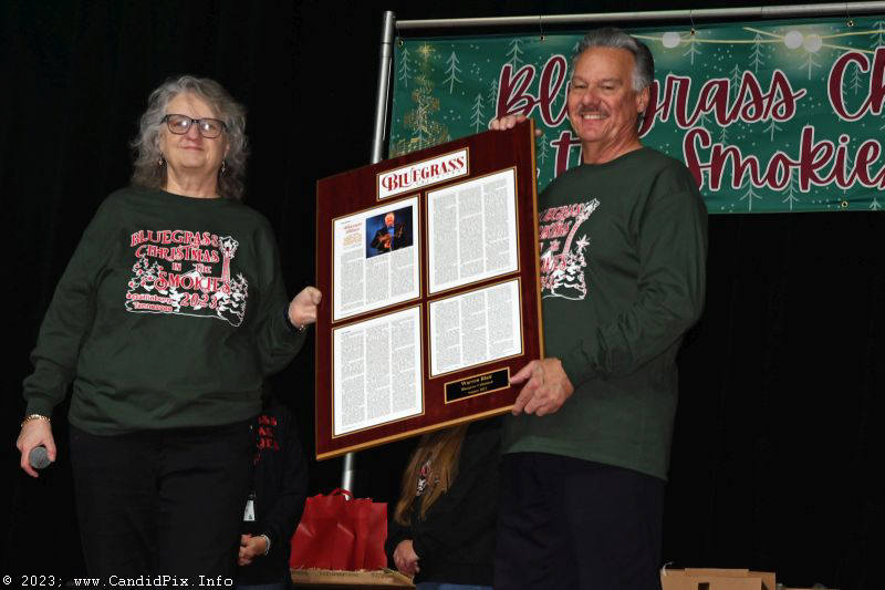 Lorraine Jordan hands out awards at the 2023 Bluegrass Christmas in the Smokies - photo © Bill Warren