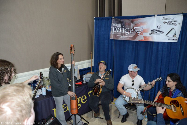 Jamming in the Paige booth at the 2023 Industrial Strength Bluegrass Festival Charity Breakfast - photo © Bill Warren
