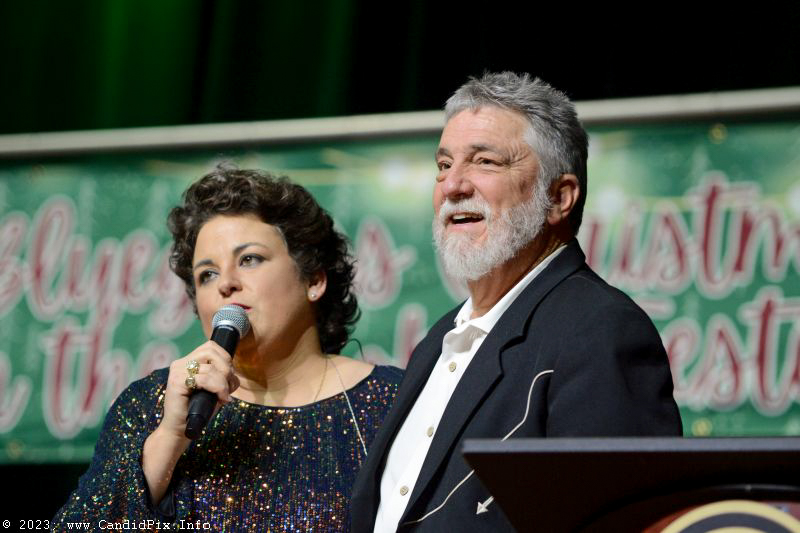 Lizzy Long and MC Doug Whitley at the 2023 Bluegrass Christmas in the Smokies - photo © Bill Warren