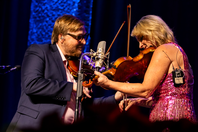 Adam Haynes and Rhonda Vincent on fiddle with The Rage at the Industrial Strength Bluegrass Festival (11/9/23) - photo © Laci Mack