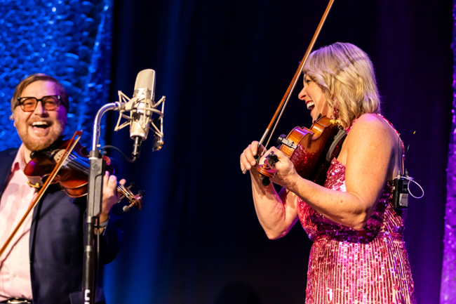 Adam Haynes and Rhonda Vincent on fiddle with The Rage at the Industrial Strength Bluegrass Festival (11/9/23) - photo © Laci Mack