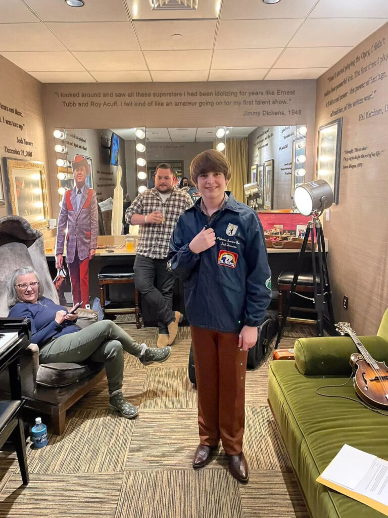 Wyatt Ellis  models Paul Brewster's Osborne Brothers jacket given to for his artist debut on the Grand Ole Opry (11/10/23) - photo by Teresa Ellis