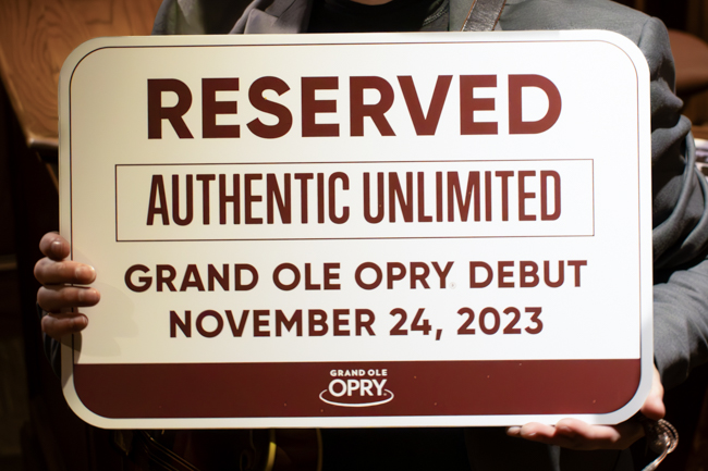 Authentic Unlimited is welcomed to their debut on the Grand Ole Opry with the traditional parking sign (11/24/23) - photo © Laci Mack