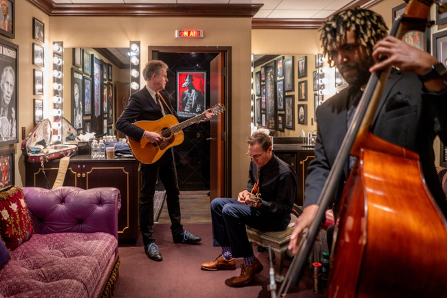 Chris Jones, Mark Stoffel, and Nelson Williams warm up backstage at the Grand Ole Opry (11/21/23) - photo © Brooke Stevens