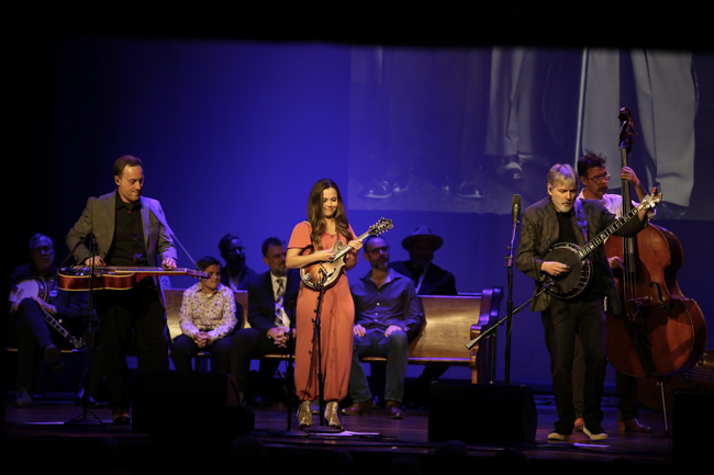 Justin Moses, Sierra Hull, and Béla Fleck at the 100th Birthday Celebration for Earl Scruggs at The Ryman Auditorium (1/6/24) - photo © Bryce LaFoon