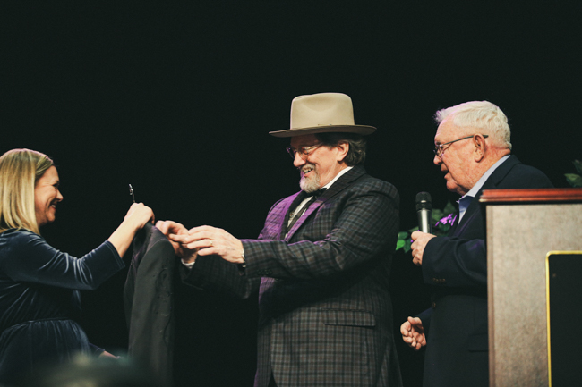 Jerry Douglas is presented with an Earl Scruggs signature jacket at Remembering Earl for The Earl Scruggs Center in Shelby, NC (1/13/24) - photo © Bryce LaFoon