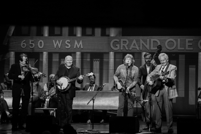 Stuart Duncan, Jim Mills, Sam Bush, Alan Bartram, and Del McCoury at the 100th Birthday Celebration for Earl Scruggs at The Ryman Auditorium (1/6/24) - photo © Bryce LaFoon