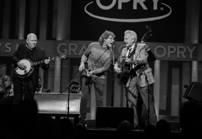 Jim Mills, Sam Bush, Alan Bartram, and Del McCoury at the 100th Birthday Celebration for Earl Scruggs at The Ryman Auditorium (1/6/24) - photo © Bryce LaFoon
