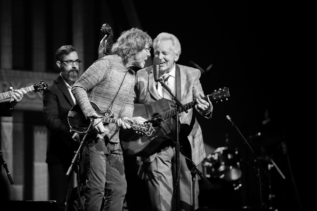 Alan Bartram, Sam Bush, and Del McCoury at the 100th Birthday Celebration for Earl Scruggs at The Ryman Auditorium (1/6/24) - photo © Bryce LaFoon