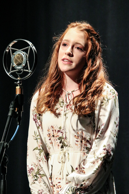 Lilly Anne Svrlinga sings the National Anthem at 2024 Winter Bluegrass Jubilee – photo © G Nicholas Hancock