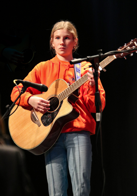 Sweet Potato Pie Kids guitar player at 2024 Winter Bluegrass Jubilee – photo © G Nicholas Hancock