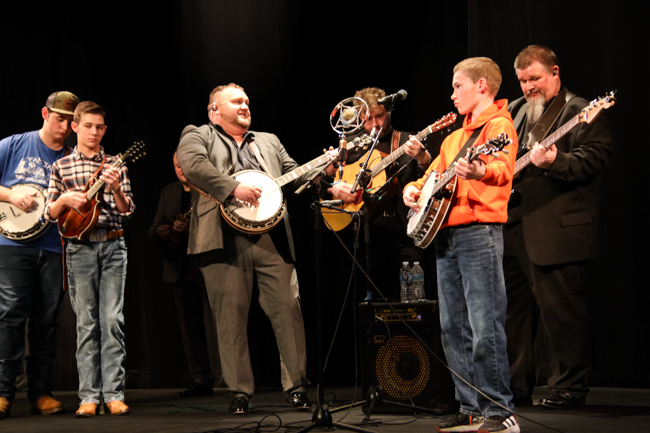 YAM alumnus jamming with Authentic Unlimited and Shannon Slaughter at 2024 Winter Bluegrass Jubilee – photo © G Nicholas Hancock