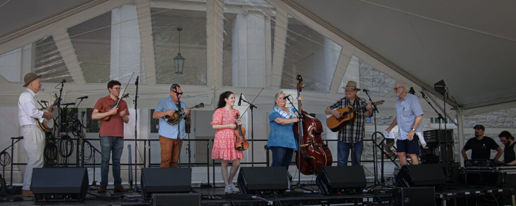 2024 Fletcher Bright Memorial Award winner Isabella March with the Dismembered Tenneseans at the 2024 Bluegrass on the Grass - photo © Frank Baker