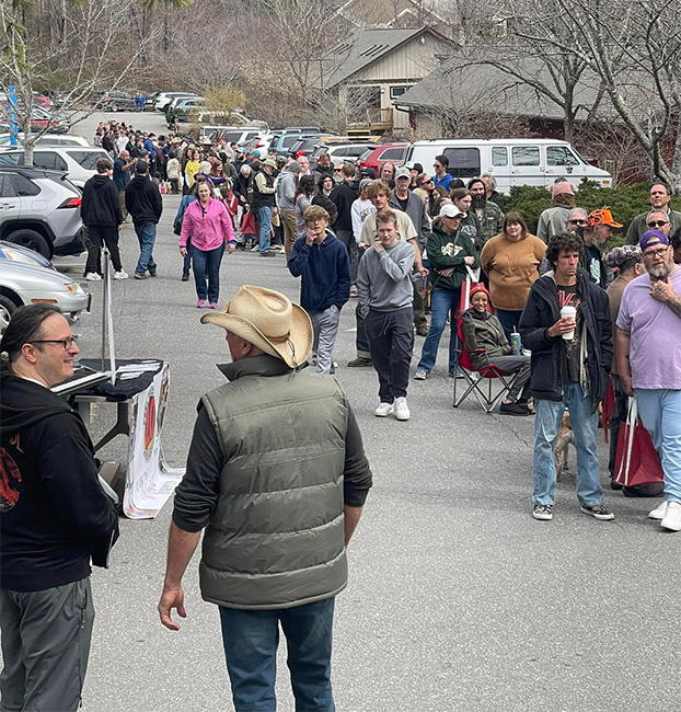 Flood survivors line up at free instrument distribution by Woodsongs in Asheville, NC (3/9/25)