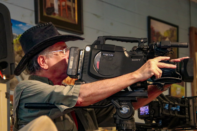 Videographer Tim Vogel at theGreg Blake house concert at the E.H. Montgomery General Store in Gold Hill, NC - photo © G Nicholas Hancock