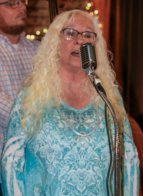 Vivian Pennington Hopkins singing Back to the Cabin in Caroline at the Greg Blake house concert at the E.H. Montgomery General Store in Gold Hill, NC - photo © G Nicholas Hancock