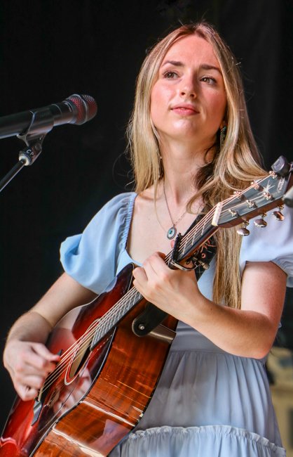 Soraya Sullivan with The Sullivan Sisters on the Youth Stage - IBMA 2025 - photo © G Nicholas Hancock