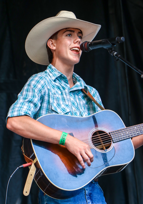 Cruse Edwards with The Blue Bridge Boys on the Youth Stage at IBMA 2025 - photo © G Nicholas Hancock
