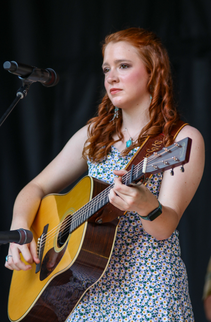 Lilly Anne Svrlinga with Creekwater Collective on the Youth Stage - IBMA 2025 - photo © G. Nicholas Hancock
