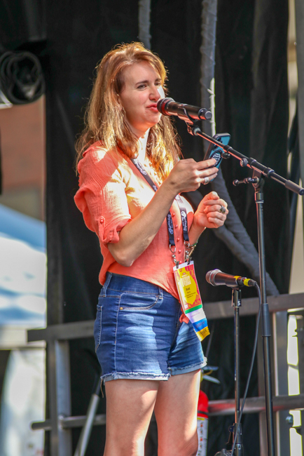 Brett Morris, MC, at the Youth Stage - IBMA 2025 - photo © G. Nicholas Hancock