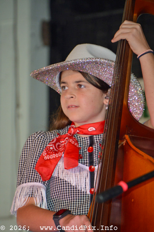 Alaniya Shamanov with The Alaskan Sunnyside Sisters at the 2026 Palatka Bluegrass Festival - photo © Bill Warren