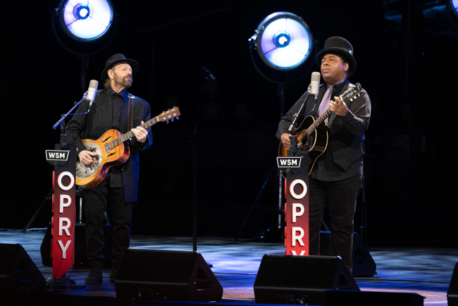 Colin Linden and Chris Thomas King on the Grand Ole Opry for the 25th Anniversary of the O Brother, Where Art Thou? soundtrack (2/28/26) - photo © Grand Ole Opry