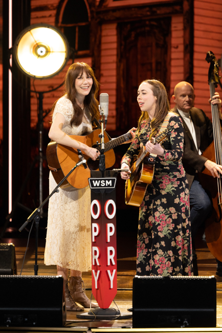 Molly Tuttle and Sarah Jarosz on the Grand Ole Opry for the 25th Anniversary of the O Brother, Where Art Thou? soundtrack (2/28/26) - photo © Grand Ole Opry