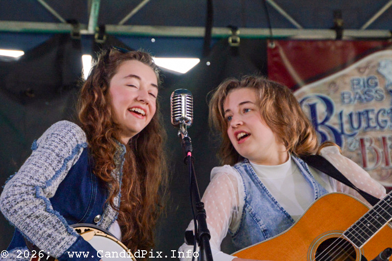Victoria and Emily Glover with Mountain Highway at the 2026 Big Bass Bluegrass & BBQ festival in Inverness, FL - photo © Bill Warren