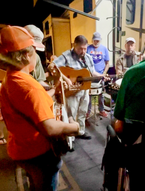 Emil Wilhelm jamming with Dana Cupp and others at the 2025 Charlotte Bluegrass Festival