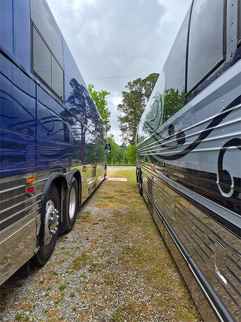 Lorraine Jordan and Junior Sisk's buses parked side-by-side at the 2026 Little Roy & Lizzy Music Festival - photo © Ami Ricci