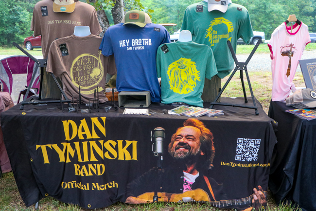 Dan Tyminski merch table at the 2026 Tony Rice Memorial MusicFest - photo © G. Nicholas Hancock