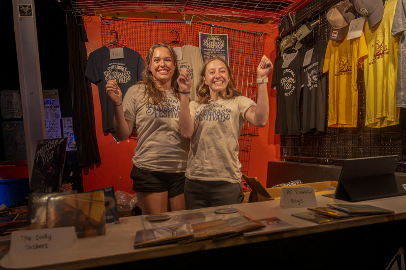 Happy merch sales at the 2026 Carrboro Bluegrass Festival (5/23/26) - photo © Thomas Beck